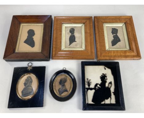 A pair of 19th century portrait silhouettes of a young lady and gentleman, 10cm by 7cm, together with four other silhouettes,