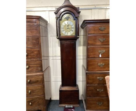 A George III mahogany longcase clock, the 12inch domed brass dial with phases of the moon, the silverised chapter ring with R