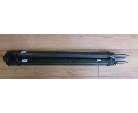 A brass mounted surveyor's or military tripod 