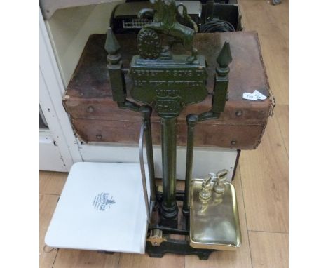 A set of Herbert & Sons, London cast iron 30Ib counter top shop scales with lion to top and ceramic pan together with two Her