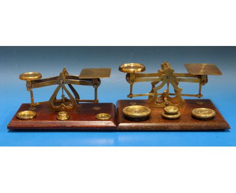 Two sets of probably Setten & Durward brass letter scales, both with weights to base 