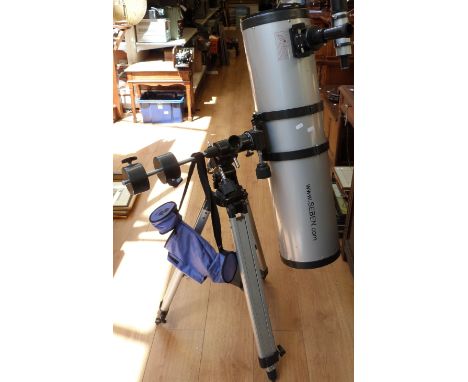 A Sebera 8" reflector telescope on tripod with various eyepieces 