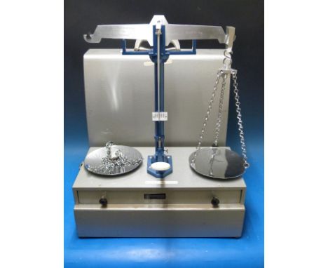 A set of Reverifications Ltd County Borough of Solihull 5kg beam scales, in travelling case with pans