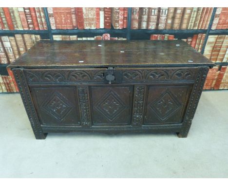 An 18thC carved oak trunk (H123 x L53 x W61cm)