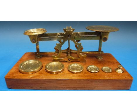 A set of Mordan & Co postage scales, with weights to base, one marked F for Packet Boat services.