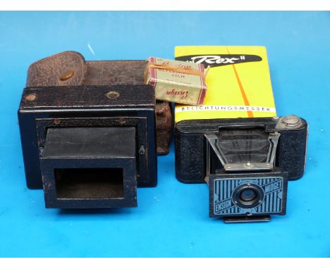 An Ernemann vest pocket folding plate camera together with a model 22 Ensign Midget and related film