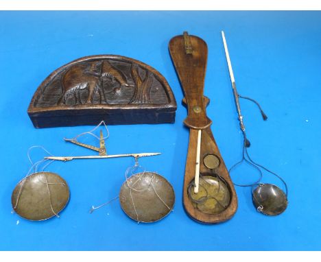 An Indian travelling beam scale in carved semi-circular box together with an eastern opium scale in a fish shaped box and one