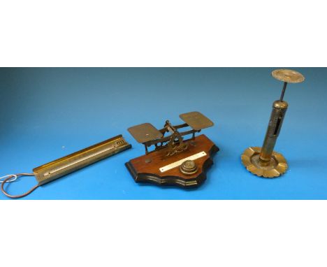 A set of postal scales and weights, brass letter candlestick scales and a thermometer 