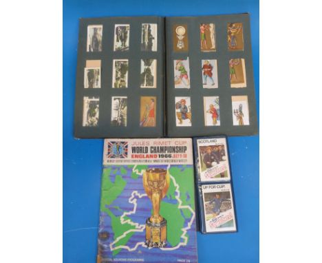 A vintage cigarette card album containing De Reszke, Evolution of the British Navy, Cavanders Ltd, Wills Cricket season 1928-