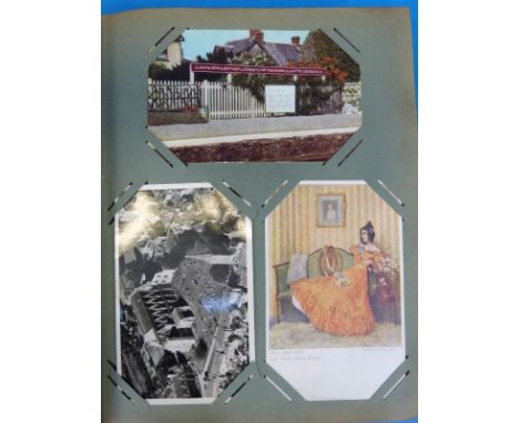 A vintage postcard album containing a mix of largely topographical subjects, approximately 190 in total (blue album)
