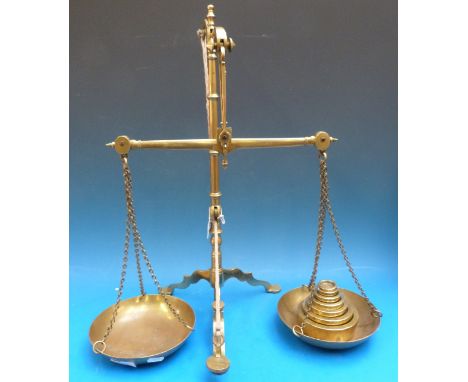 A set of Boyle & Son banking beam scales together with a run of sovereign weights 200 down to 5 sovereigns