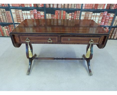 A small mahogany sofa table 