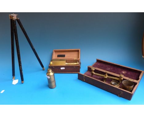 An architect's compass in brass case and outer wooden case together with parts of telescope and pull out tripod with brass fe