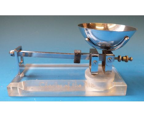 A set of modern chrome and perspex postage or similar scales, marked to one side Charles of the Ritz 