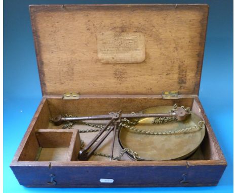A cased set of De Grave & Co travelling beam scales, label to inside of lid of oak case 