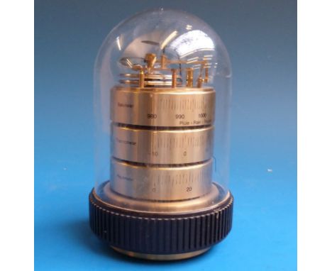 A Barigo desk top barometer, thermometer and hygrometer under a dome 