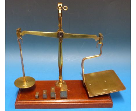 A set of De Grave & Co GP0 postage scales stamped GP0 to both pans, with 0.5, 1, 2 and 4oz weights