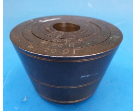 A run of bronze cup weights 16oz to ½oz