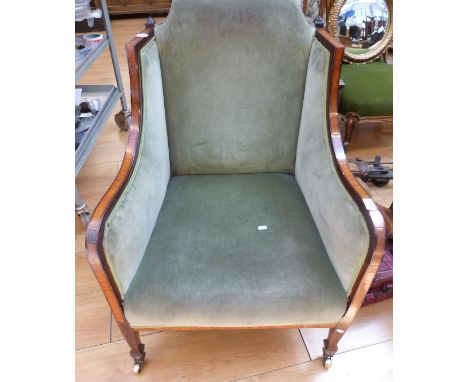 A mid to late 19thC Sheraton chair with banded inlay and carved finial decoration 