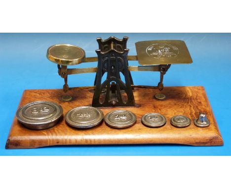 A set of possibly Setten & Durward postage scales, having Arts and Crafts / Arts Nouveau Archibald Knox inspired supports, on