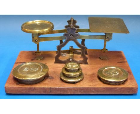 A set of possibly Setten & Durward letter scales with steel A frame supports, on oak base with weights