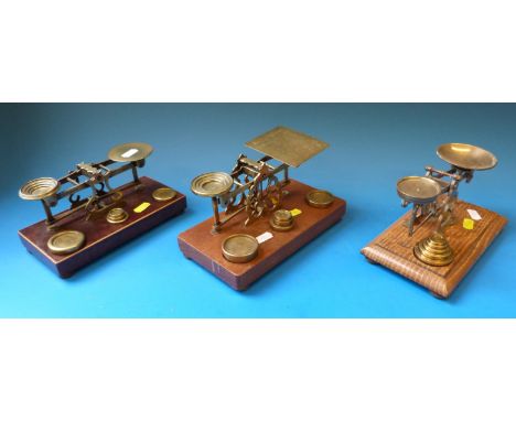 Three sets of 19thC letter scales, two S Mordan & Co, the other with burr wood base with inlay edge