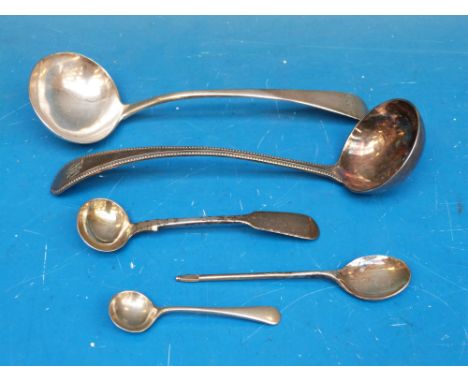 A Georgian hallmarked silver ladle, another hallmarked spoon and three plated