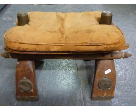 A Libyan leather camel stool