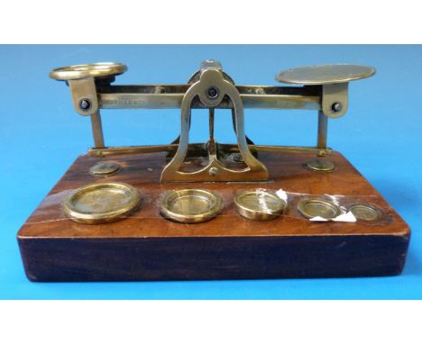 A set of Mordan & Co postage scales with weights to base