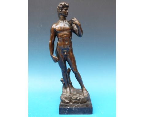 A bronze of a standing classical male nude (height 38cm)