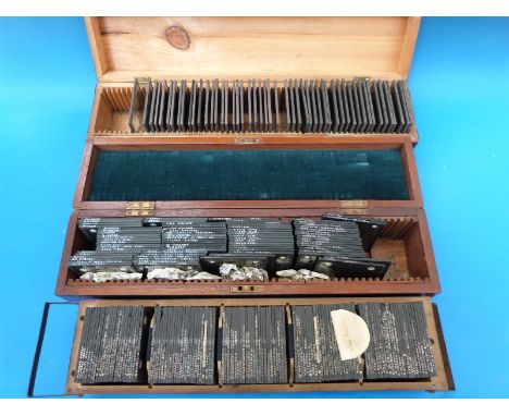 Three wooden cases containing magic lantern slides including  Furness Abbey, Kern Knotts, waterfalls of Scotland, Sir Walter 