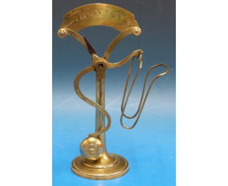 A G. Riddle London brass pendulum type postage scale with wire letter rack, the scale marked in oz and postage (1d at 1oz), t