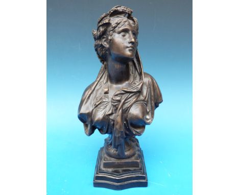 A bronze bust of a lady on stepped base, signed to reverse Bruchon (height 29cm)