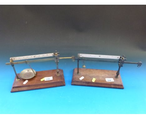 Two pairs of Avery Ltd cantilever beam scales