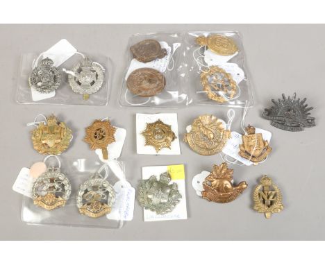 A collection of military badges including Royal Army Service Corps George VI, Rifle Brigade Prince Consorts Own, Womans Army 