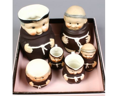 A quantity of Goebel ceramics formed as monks including jugs, egg cup etc.