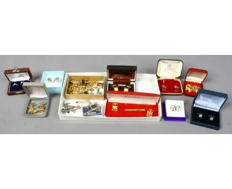 A box of gents cufflinks and tie pins etc.
