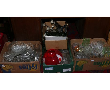 Four boxes of mixed glassware and metalware to include candelabra decorative vases, dressing table set etc.