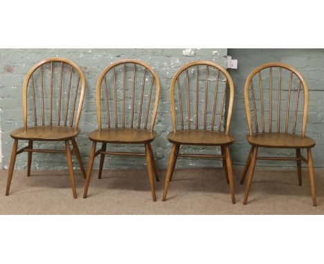 Four Ercol Windsor dining chairs.