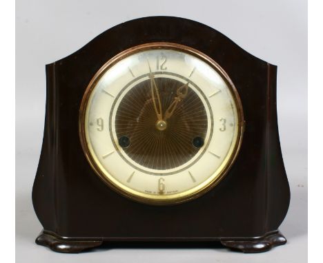 A 1930s Smiths bakelite cased 8 day mantle clock striking on a gong.