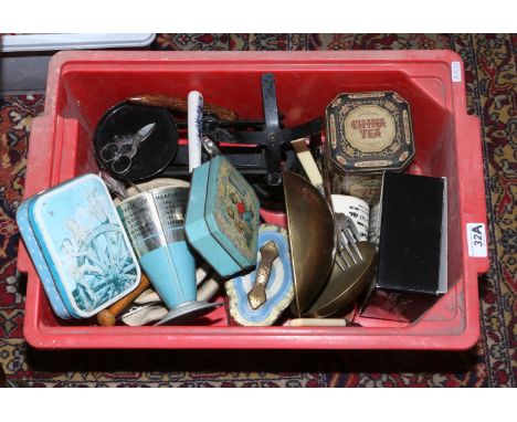 A box of kitchenalia including weighing scales, pestle and mortars, flatwares, storage tins etc.