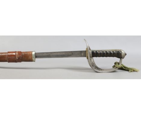 A World War II infantry officers sword in leather mounted scabbard and grip.