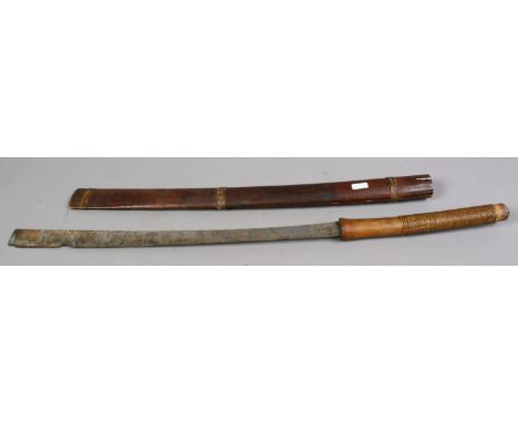 An oriental sword with bamboo handle bound with vegetable stands and having wooden scabbard.