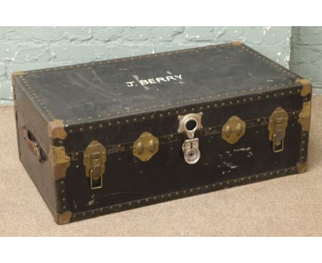 An early 20th century metal bound steamer trunk.