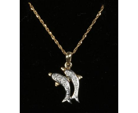 A 9ct gold diamond set novelty dolphin pendant on 9ct gold chain.