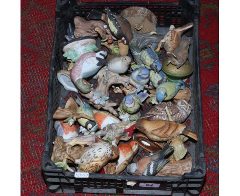A collection of ceramic bird figures.