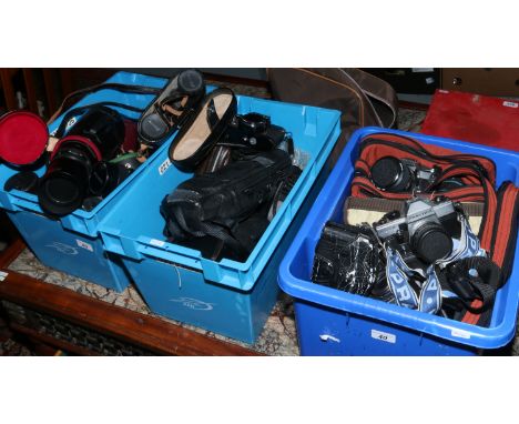Three boxes of photographic Praktika Pentax Minolta and various 35 SLR cameras, Canon Auto Zoom 814, Cine camera cased zoom a