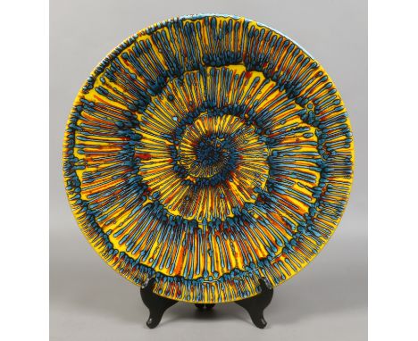 A large studio pottery charger for Poole pottery 1999 by Janice Tchalenko, signed to the base.
