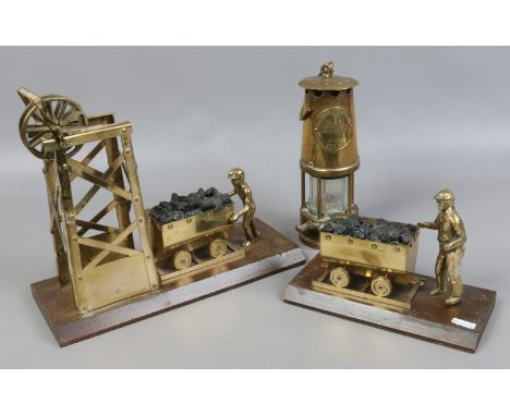 A vintage Eccles type 6 Miners brass safety lamp along with two brass mining themed ornaments.