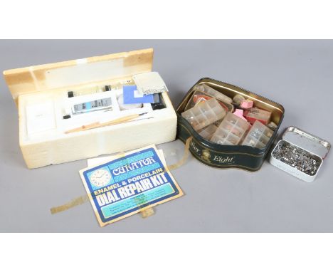 A collection of watch repairers spare parts and an enamel and porcelain dial repair kit.